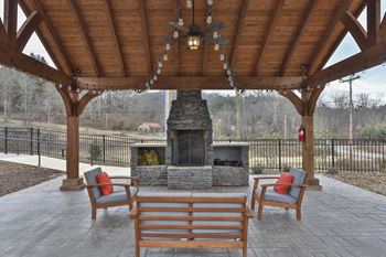 Outdoor pergola w/ fireplace